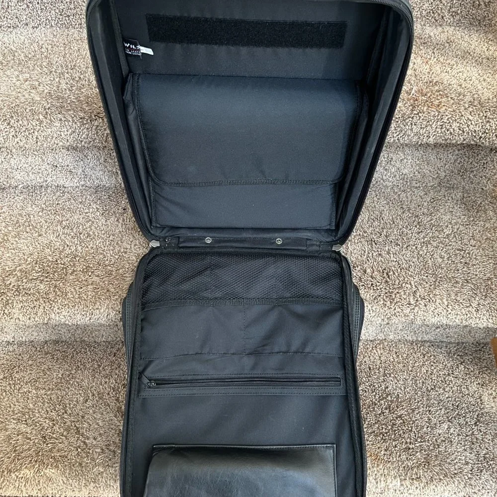 Wilson’s Black Leather Carry on Luggage.